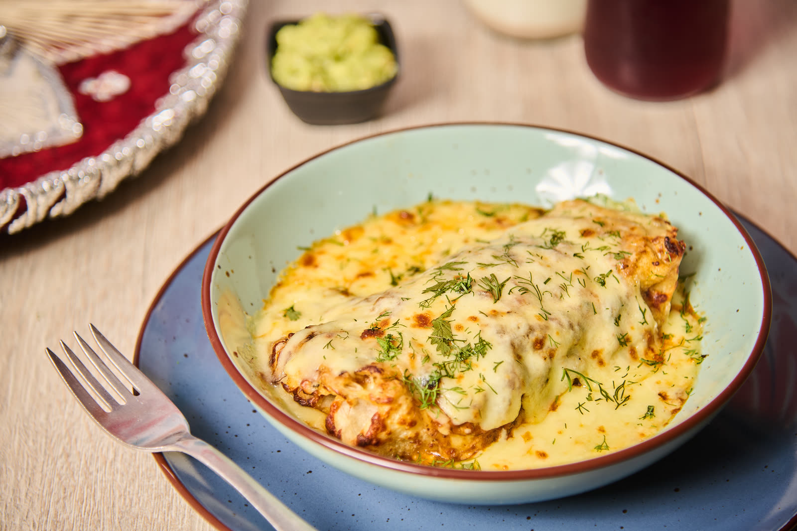 Gratinated Mexican enchiladas at Amor al Taco Bogotá